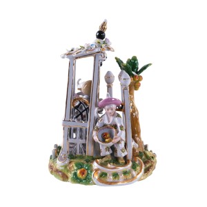 Figural ceramic candleholder with Oriental scene, glazed ceramics, turn of the 20th century