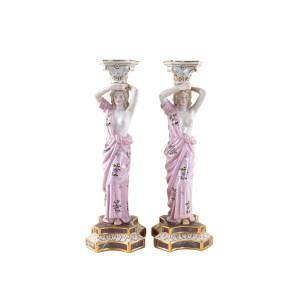 Pair of Art Deco figural ceramic candlesticks with pink and gold glaze, European craftsmanship