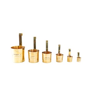 Brass measuring cups set in Bauhaus style, European craftsmanship 20th century